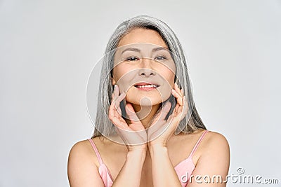 Senior happy middle aged mature asian woman headshot portrait. Skin care advertising. Stock Photo