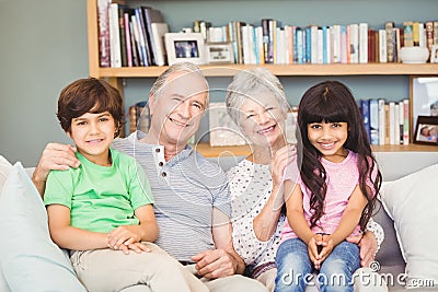 Portrait of grandchildren with grandparents at home Stock Photo