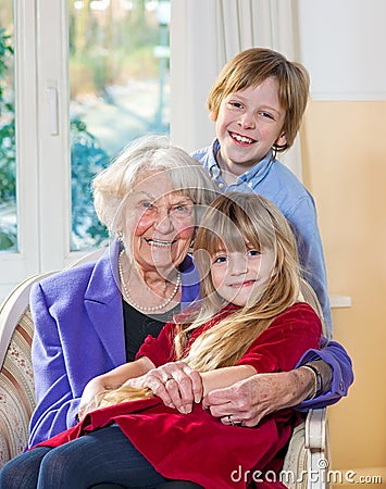 Portrait of a grandmother with her grandchildren. Stock Photo