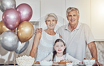 Portrait, grandparents or girl in celebration of a happy birthday in house party or kitchen with popcorn or cake Stock Photo