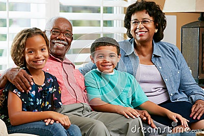 Portrait Of Grandparents With Grandchildren Stock Photo