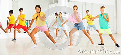 Portrait of group of boys and girls having dancing class in studio Stock Photo