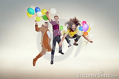 Portrait of group of funny friends on a party Stock Photo