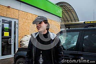 Guillaume Ptak, french journalist at Okko gas station, Sloviansk, Ukraine - April 03, 2023 Editorial Stock Photo