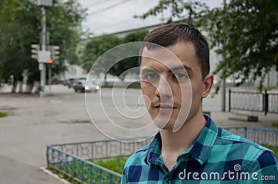Portrait of a guy on the streets of the city Stock Photo