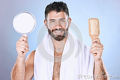 Portrait, hair and mirror by man in studio for styling, treatment and product advertising on gradient background. Face Stock Photo