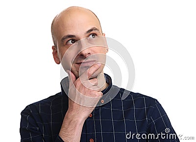 Portrait of a handsome bald man thinking Stock Photo