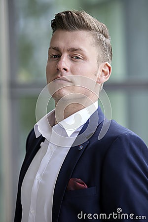 Portrait of handsome blond man looking at camera Stock Photo