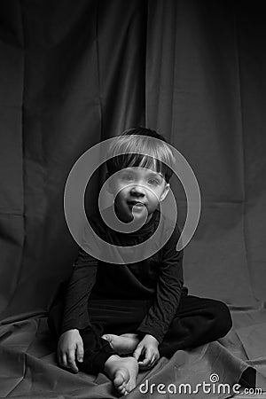 Portrait of handsome caucasian boy. loneliness. homeless. black and white Stock Photo