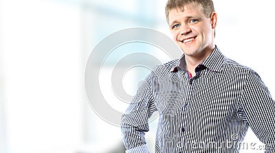 Portrait of handsome confident young businessman standing Stock Photo