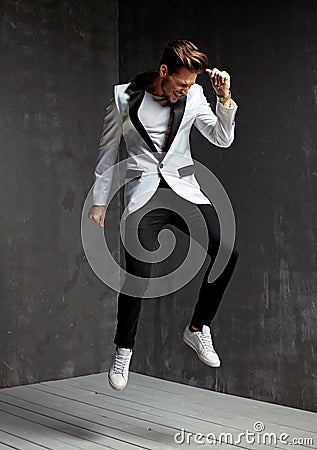 Portrait of a handsome, dancing young model Stock Photo