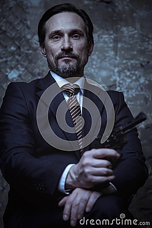 Portrait of a handsome dangerous man Stock Photo
