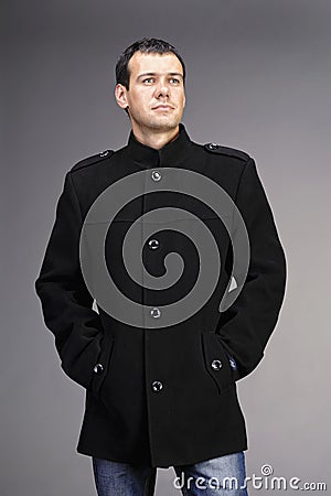 Portrait of handsome man in coat Stock Photo