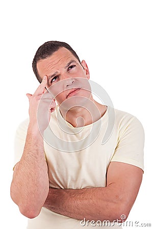 Portrait of a handsome man thinking, looking up Stock Photo