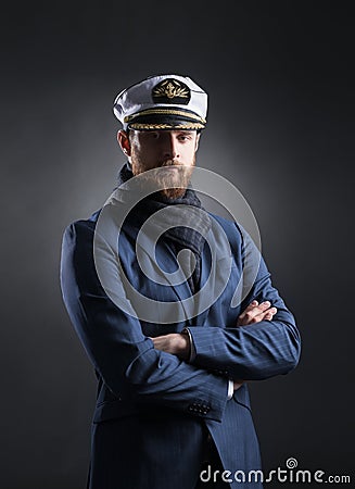 Portrait of a handsome sailor on a dark background Stock Photo