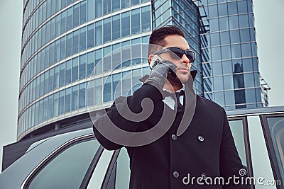 Portrait of a bodyguard in a stylish suit. Stock Photo