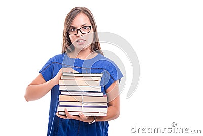 Portrait of student girl holding bunch of books Stock Photo