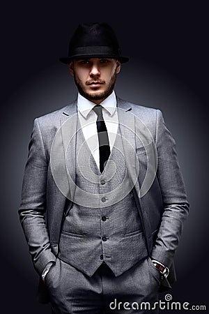 Portrait of handsome stylish man in elegant suit Stock Photo