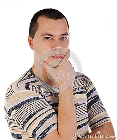 Portrait of a handsome thinking young man Stock Photo