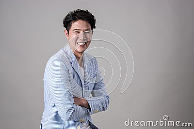 Portrait of a happy Asian business man Stock Photo