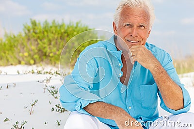 Portrait of Attractive Handsome Senior Man on Beach Stock Photo