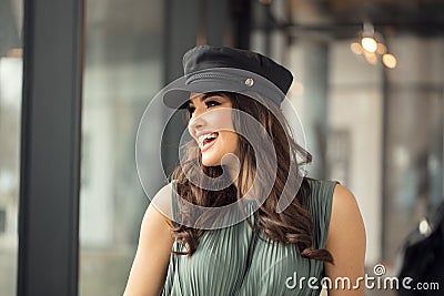 Portrait of happy woman in french style hat Stock Photo