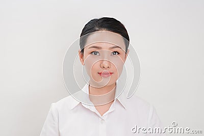 Portrait of happy beautiful young businesswoman smiling looking Stock Photo