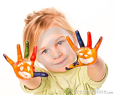 Portrait of a happy cheerful girl showing her hands painted in bright colors Stock Photo