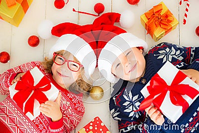 Portrait of happy children with Christmas decorations Stock Photo