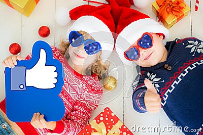 Portrait of happy children with Christmas decorations Stock Photo