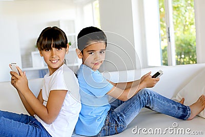 Portrait of happy children playing at home Stock Photo