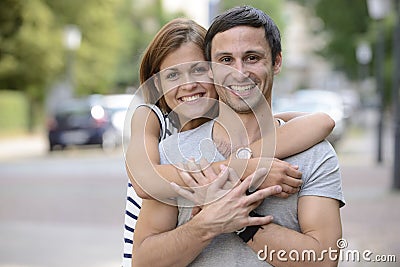 Portrait of a happy couple hugging Stock Photo