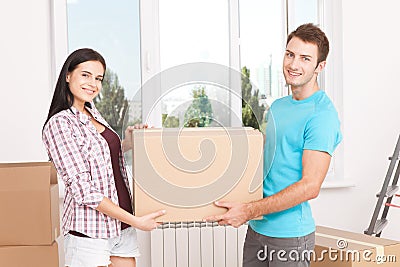 Portrait of happy couple in new home Stock Photo