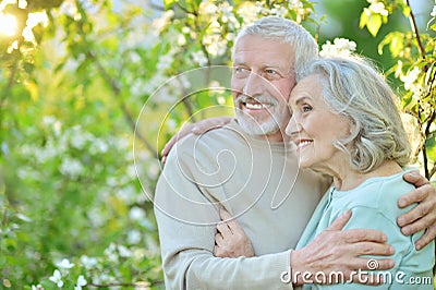 Happy couple posing in park Stock Photo