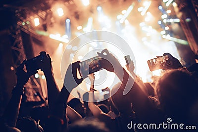 Portrait of happy crowd enjoying at music festival Stock Photo