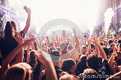 Portrait of happy crowd enjoying at music festival Stock Photo