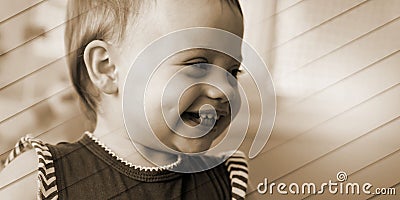 Portrait of happy baby girl, geometric pattern Stock Photo