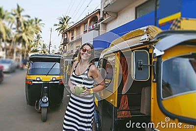 Portrait of happy woman on city street Stock Photo