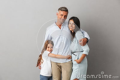 Portrait of a happy family father, mother, little daughter Stock Photo