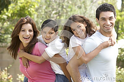 Portrait of Happy Family In Park Stock Photo