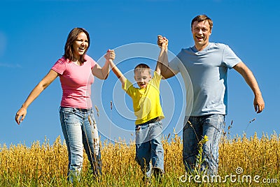 Portrait of a happy family of three Stock Photo