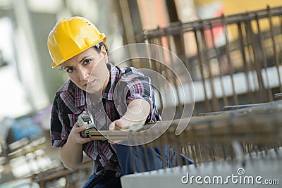 Portrait happy female construction worker Stock Photo