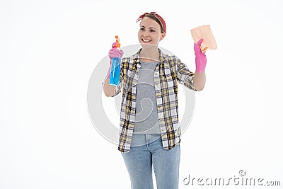 Portrait of happy female doing house duties wearing rubber gloves and holding cleaning equipment. Cheerful look. Hygiene, cleaning Stock Photo