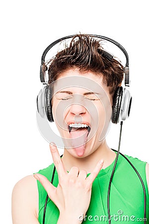 Portrait of happy girl loves hard rock with headphones Stock Photo