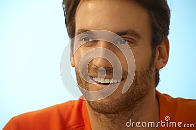 Portrait of happy handsome casual man with stubble Stock Photo