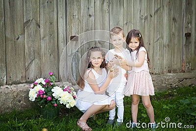 Portrait of happy kids with adorable rabbit Stock Photo
