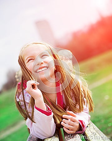 Portrait of a happy liitle girl Stock Photo