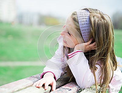 Portrait of a happy liitle girl Stock Photo