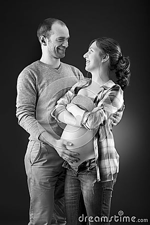 Portrait of a happy pregnant couple Stock Photo