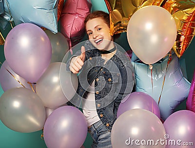Portrait of happy redhair girl waiting for party. Stock Photo